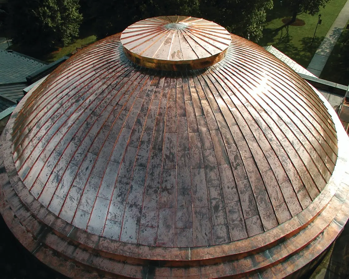 Craftsman Roofing crew installing a new roof in North Patchogue